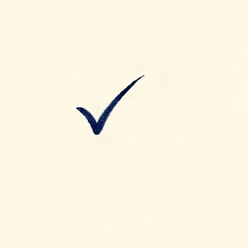Confirmation tick mark in deep indigo on a warm cream background